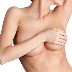 Before and after breast augmentation concept, woman with very large  silicone breasts after correction surgery Stock Photo