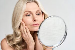 Woman looking in a mirror