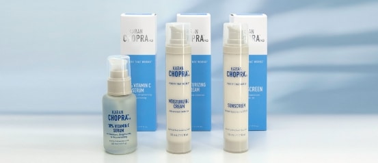 Karan Chopra, MD™ Skincare products, including 10% Vitamin C serum, moisturizing cream, and sunscreen